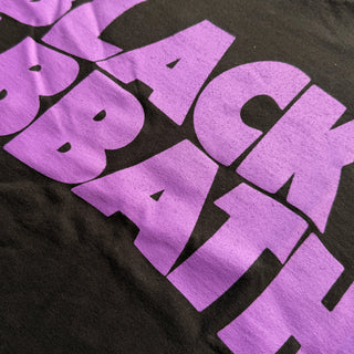 Black t-shirt with purple 'Black Sabbath' logo