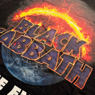 Black Sabbath logo with fiery design on a dark background