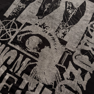 Close-up of a textured surface with abstract designs and text.