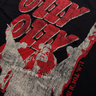 Close-up of a graphic t-shirt with red and white design on a black background
