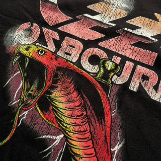 T-shirt with a snake graphic and 'Ozzy' text on a dark background