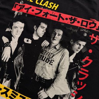 Vintage t-shirt with a band graphic and Japanese text